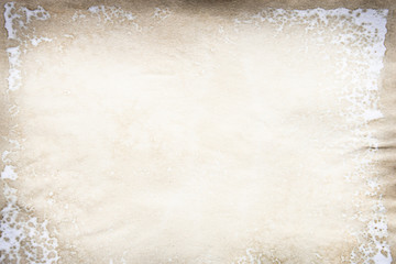 Old brown and white paper stained with coffee. Vintage abstract background.