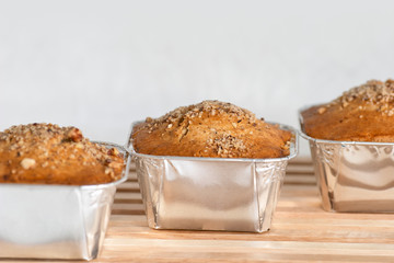 Set of three mini bio cakes home made against white background