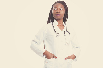 Serious Female american african doctor, nurse woman wearing medical coat with stethoscope. Happy excited for success medical worker posing on light background isolated