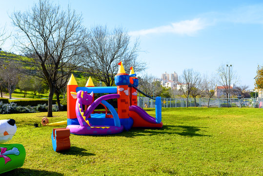 Inflatable castle outdoor at sunny summer day.