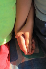 children hands holding together