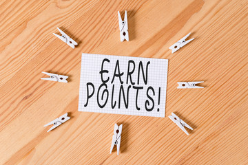 Conceptual hand writing showing Earn Points. Concept meaning collecting scores in order qualify to...
