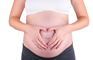 A cute pregnant belly isolated on a white background