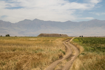 Iraq Kurdistan landscape view of Zagros and ancient mound