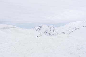 Fototapeta na wymiar snow corridor on Tateyama Kurobe Alpine Route, Japanese Alp