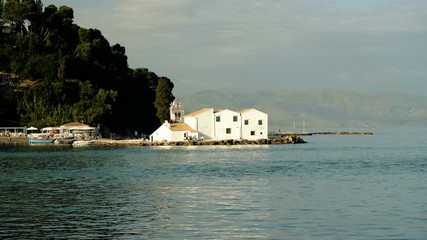 Seascape. Orthodox Church on an island in the Ionian sea. Greece. 4K
