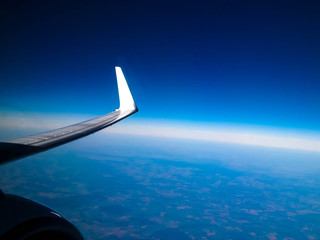 Fototapeta na wymiar View from plane window on Planet Earth.