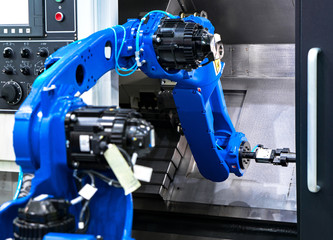 Close up robot hands in milling /drilling metalworking process,mechanical turning metal working ,metal work Industrial ,CNC metal machining ,hand tool machine,industrial robots