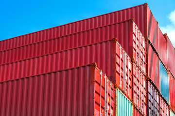Stack of containers box from Cargo freight ship for import-export at harbor and transportation industrial concept.