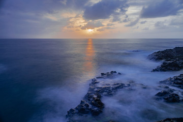 Mesa del Mar volcanic rocks coastline, long exposure photography, Atlantic ocean with sunset light, Tacoronte, Tenerife, Canary islands, Spain