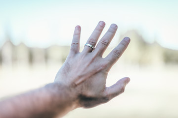 hands on sky background