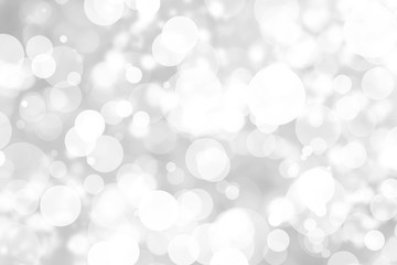 Abstract background with White bokeh on gray background. christmas blurred beautiful shiny Christmas lights.