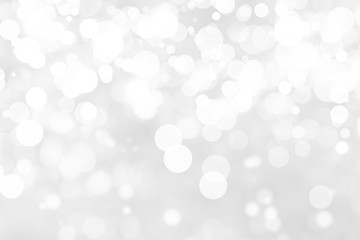 Abstract background with White bokeh on gray background. christmas blurred beautiful shiny Christmas lights.