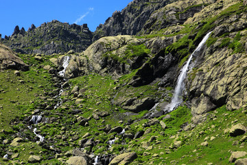 Fototapeta na wymiar Waterfall near Lake Okhodje (2543 m). The Caucasus