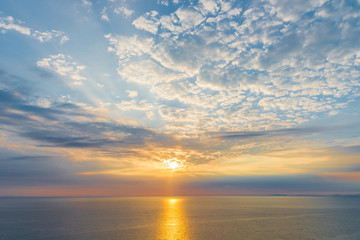 Background with colours clouds on blue sky at sunset in Greece