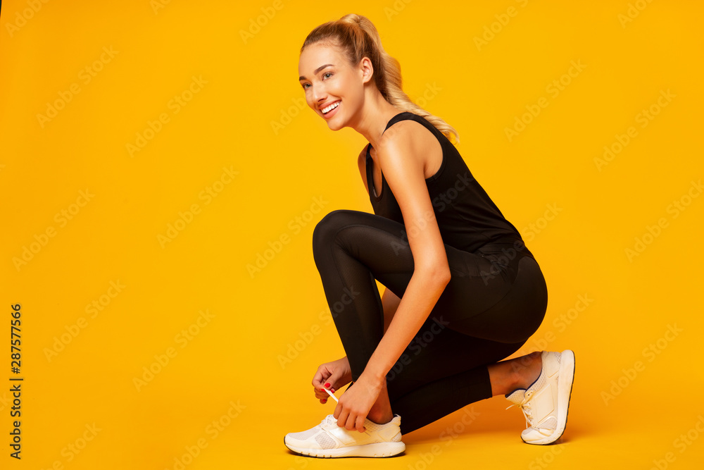 Sticker Girl Lacing Shoes Getting Ready For Workout, Yellow Background