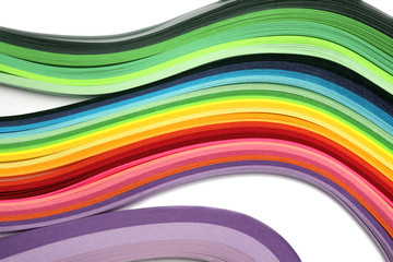 Watercolor paint rainbow palette with brush on white texture paper.