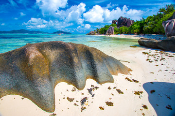 Source d'Argent, the famous beach of La Digue Island with a granite rock in the foreground