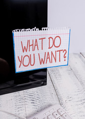 Text sign showing What Do You Want Question. Business photo text say or write in order to ask demonstrating about something Notation paper taped to black computer monitor screen near white keyboard