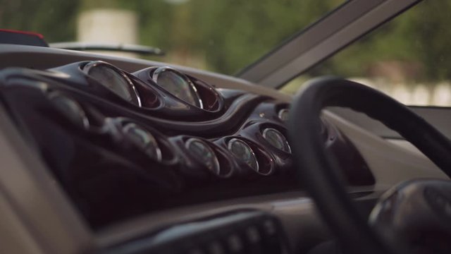 Motor boat gauges and steering wheel helm in modern boat