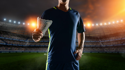 Soccer players holding large amount of bills at Soccer stadium in background