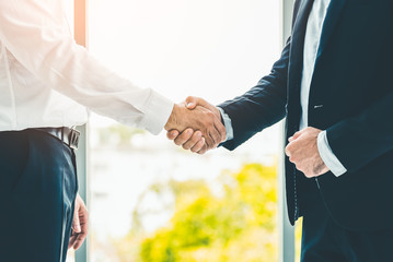 Business people shaking hands. Partnership and business agreement.  Business and office concept.