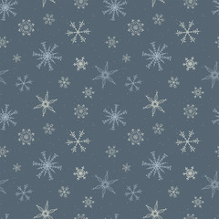 Fun hand drawn snowflakes seamless pattern - beautiful seasonal christmas background, great for banners, wallpapers, invitations, cards, wrapping paper - vector surface design