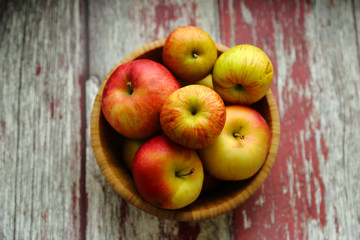 Autumn apples bowl wooden background