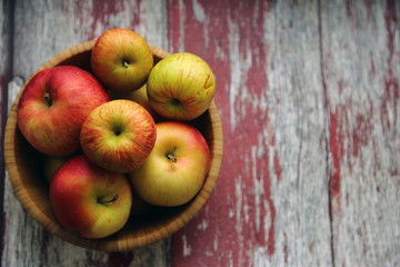 Autumn apples bowl wooden background