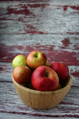 Autumn apples bowl wooden background