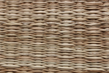 Obraz premium Wicker background, a fragment of a wicker basket