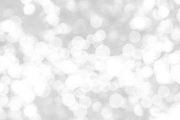 Abstract background with White bokeh on gray background. christmas blurred beautiful shiny Christmas lights.