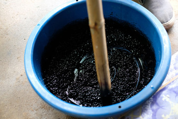 plant seed stirring in acid for peeling husk shell