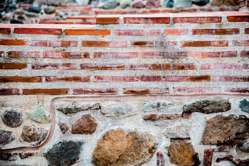 Detail of colorful stone wall in the center of Sofia.
