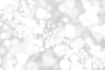 Abstract background with White bokeh on gray background. christmas blurred beautiful shiny Christmas lights.