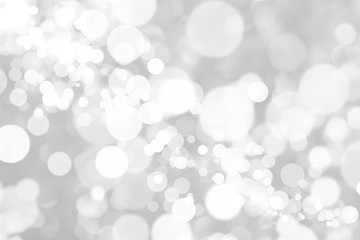 Abstract background with White bokeh on gray background. christmas blurred beautiful shiny Christmas lights.