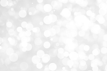 Abstract background with White bokeh on gray background. christmas blurred beautiful shiny Christmas lights.