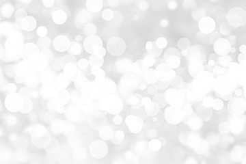 Abstract background with White bokeh on gray background. christmas blurred beautiful shiny Christmas lights.