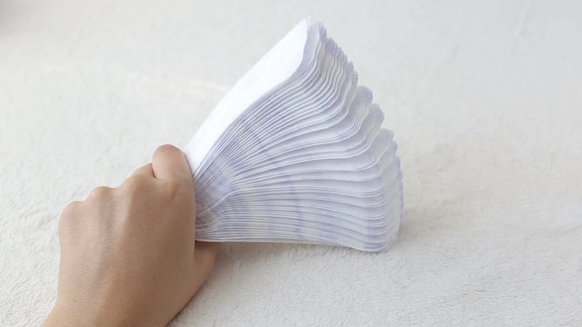 Girl runs a pen on daily sanitary pads concept of lightness and cleanliness, sanitary napkins