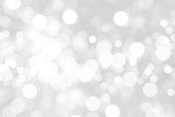 Abstract background with White bokeh on gray background. christmas blurred beautiful shiny Christmas lights.