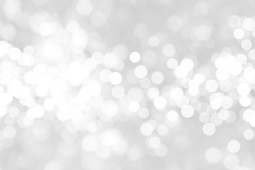 Abstract background with White bokeh on gray background. christmas blurred beautiful shiny Christmas lights.