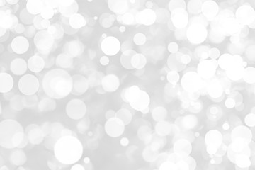 Abstract background with White bokeh on gray background. christmas blurred beautiful shiny Christmas lights.