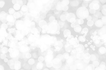 Abstract background with White bokeh on gray background. christmas blurred beautiful shiny Christmas lights.