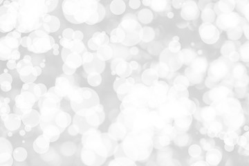 Abstract background with White bokeh on gray background. christmas blurred beautiful shiny Christmas lights.