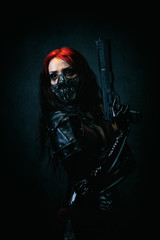 Naklejka premium Young black-eyed Cyborg in leather armor holding a revolver in his hand