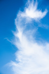 blue sky and white patterned clouds