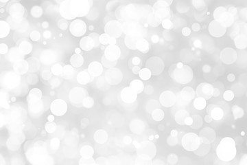 Abstract background with White bokeh on gray background. christmas blurred beautiful shiny Christmas lights.