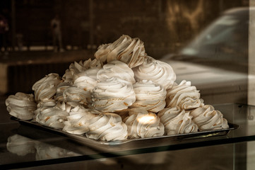 Fresh marshmallow on the shopwindow of bakerie conditoria