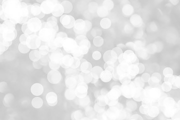 Abstract background with White bokeh on gray background. christmas blurred beautiful shiny Christmas lights.