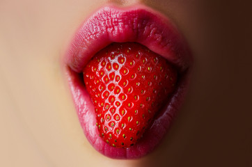Sexy woman eating strawberry. Sensual red lips. Red lipstick. Desire. Sexy lips with strawberry. Natural cosmetic. Clean skin. - 287590147